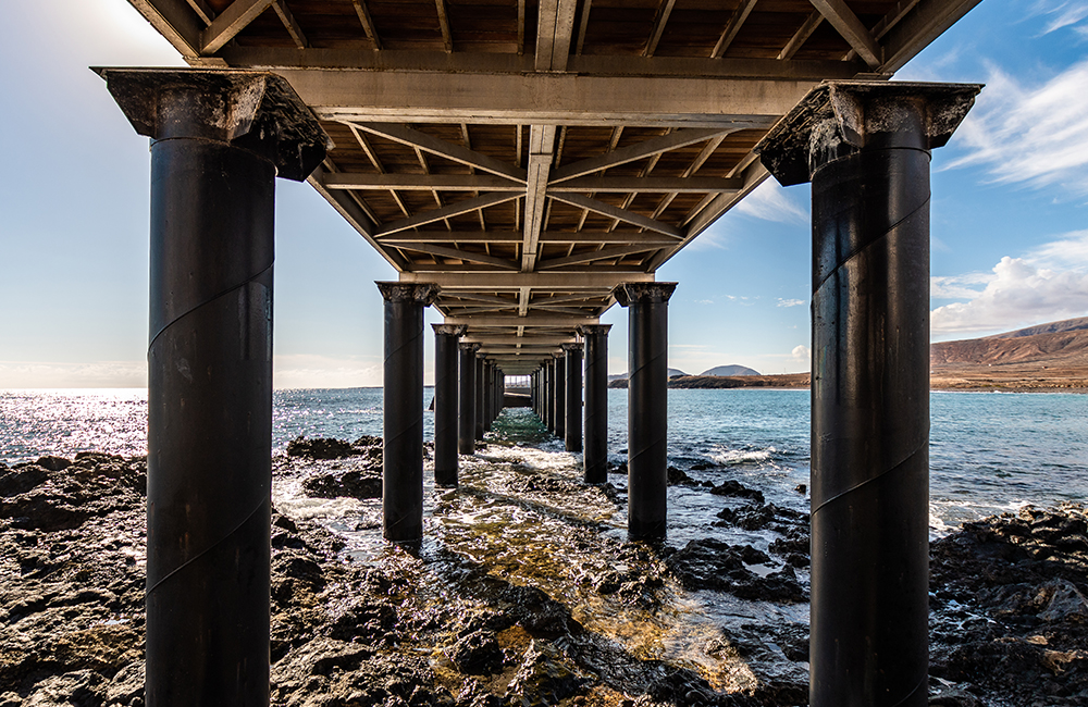 Under the bridge in Arrieta beach